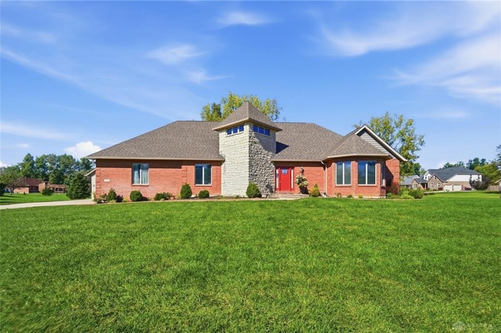 Front exterior of the custom-built home at 1576 Meadowlands Drive in Fairborn on a one-acre corner lot