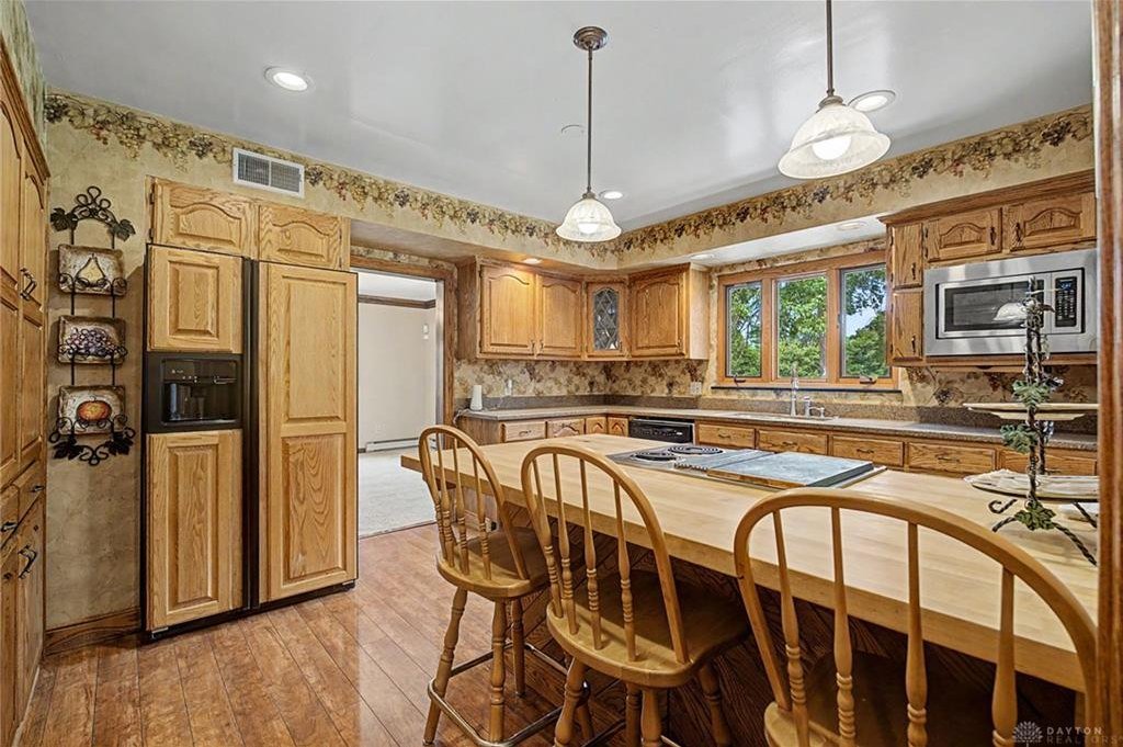 Converted carriage house on the neighboring parcel at the same Deweese Parkway address