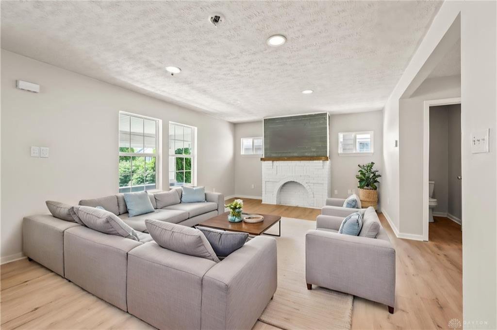 Upstairs bedroom with hardwood flooring